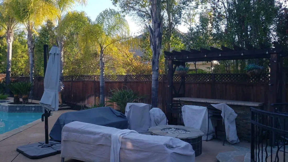 Poolside fence run photographed in low evening light